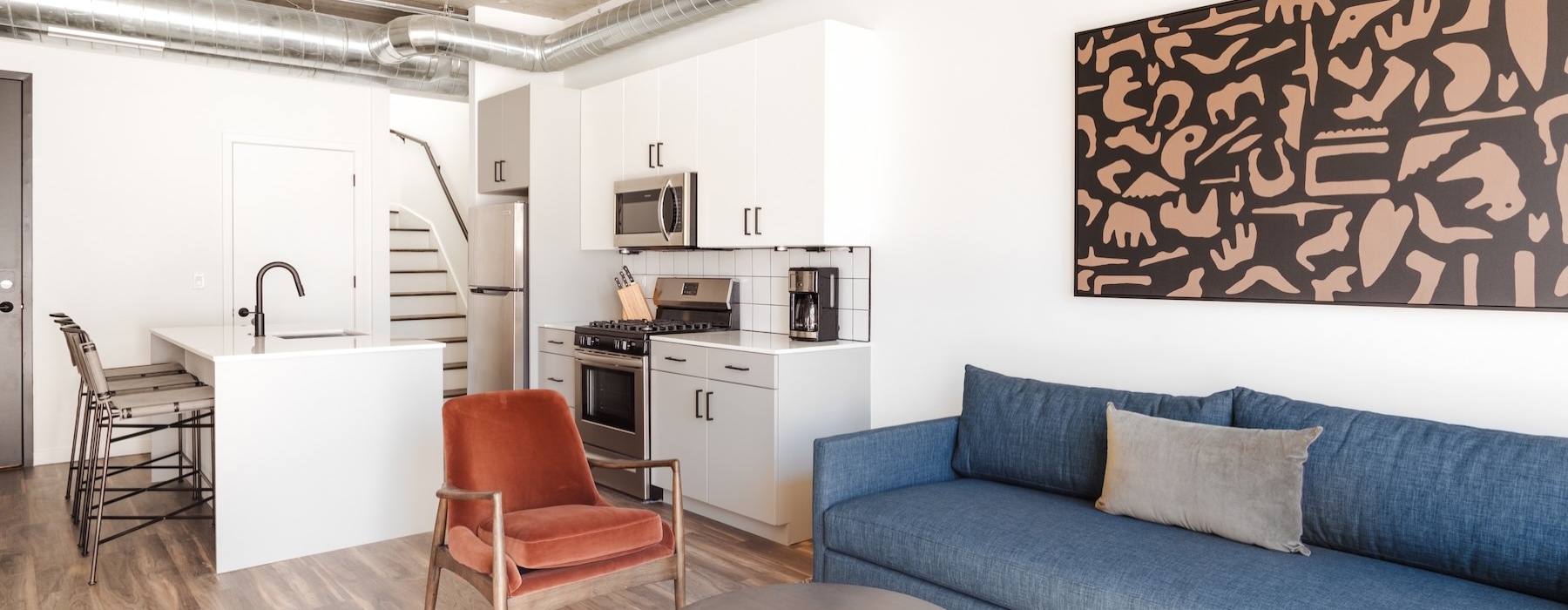 a living room with a couch and a table