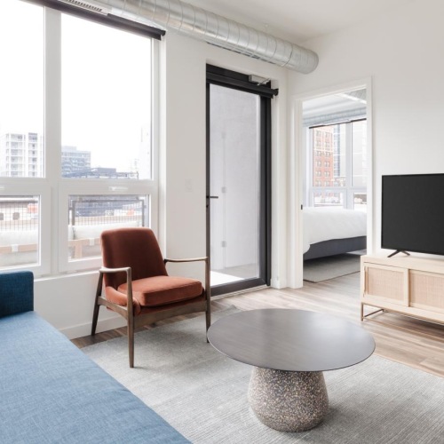 a living room with a tv and a couch